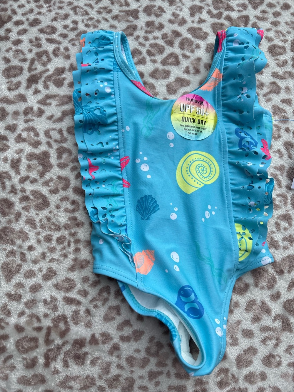 NWOT Hurley Size 12 Months Girls Blue Seashell Ruffle One Piece Swimsuit UPF 50+
